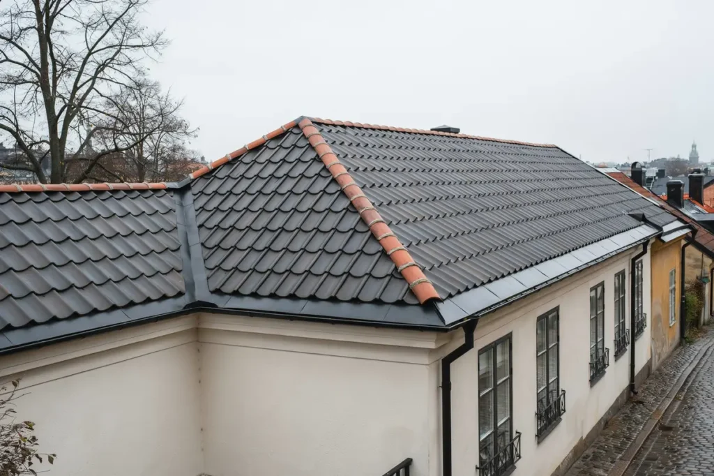 takm lning av betong och tegelpannor i s dermalm